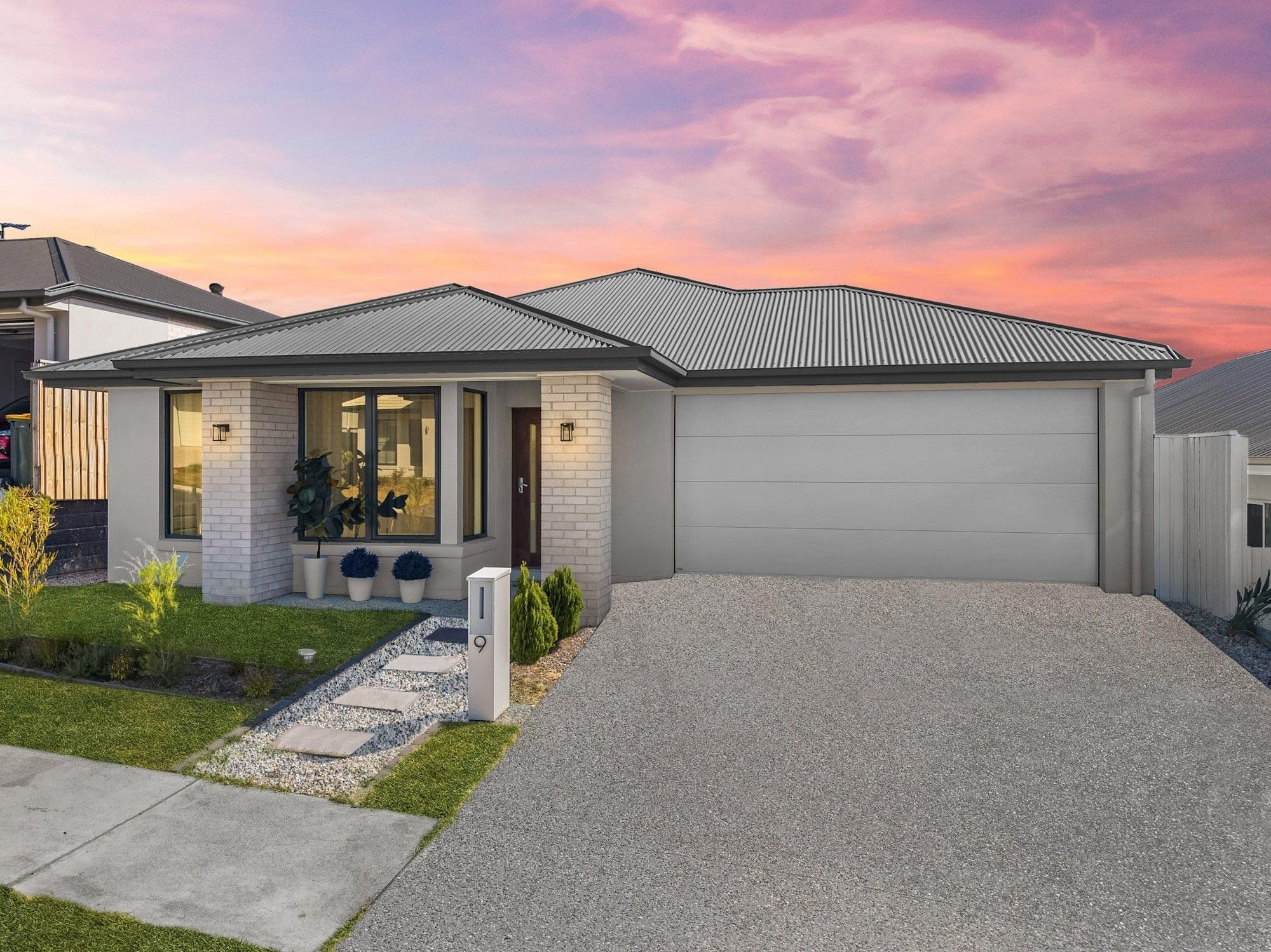 Contemporary residence beneath a pink twilight sky