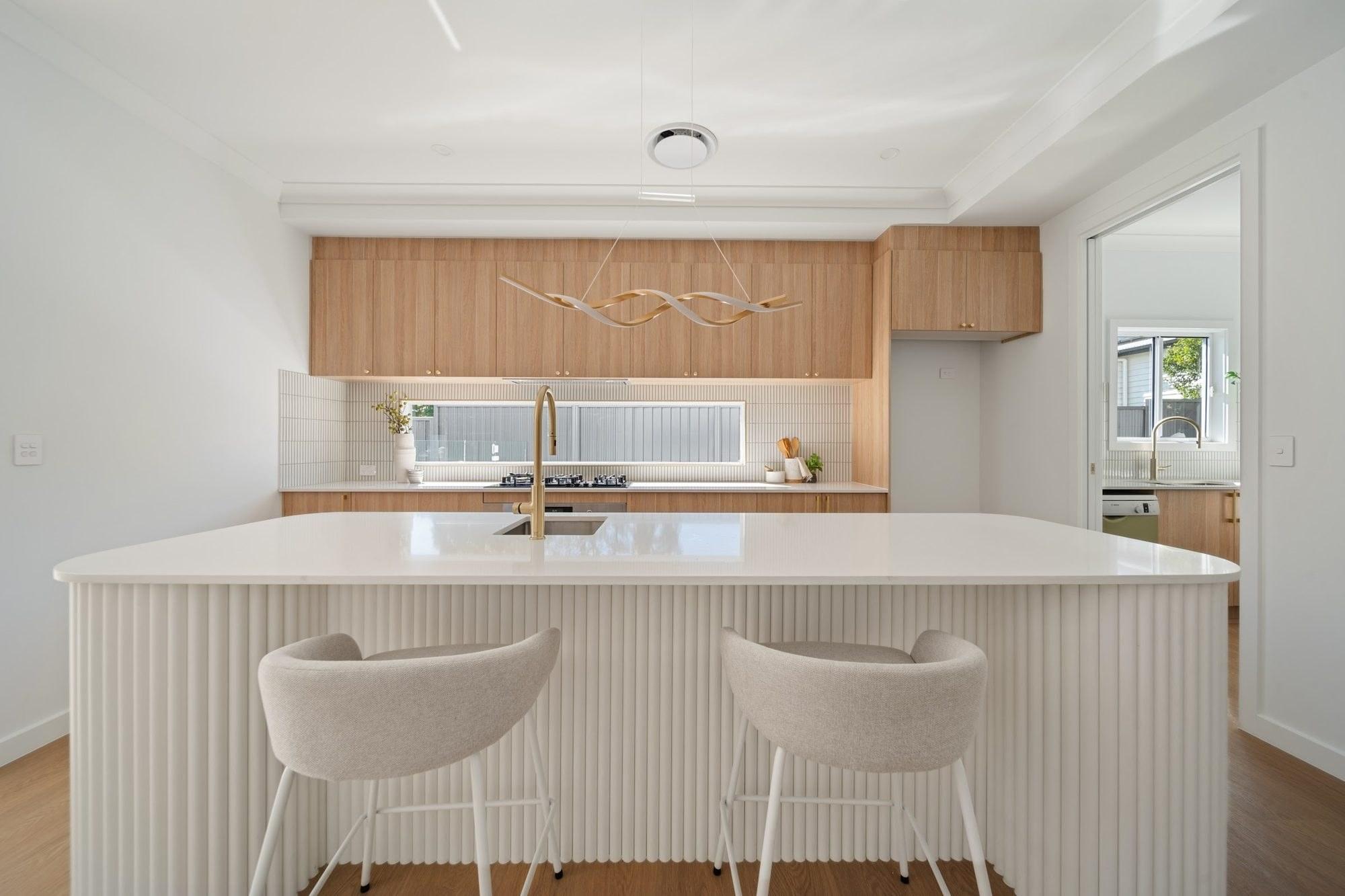 Kitchen with curved island